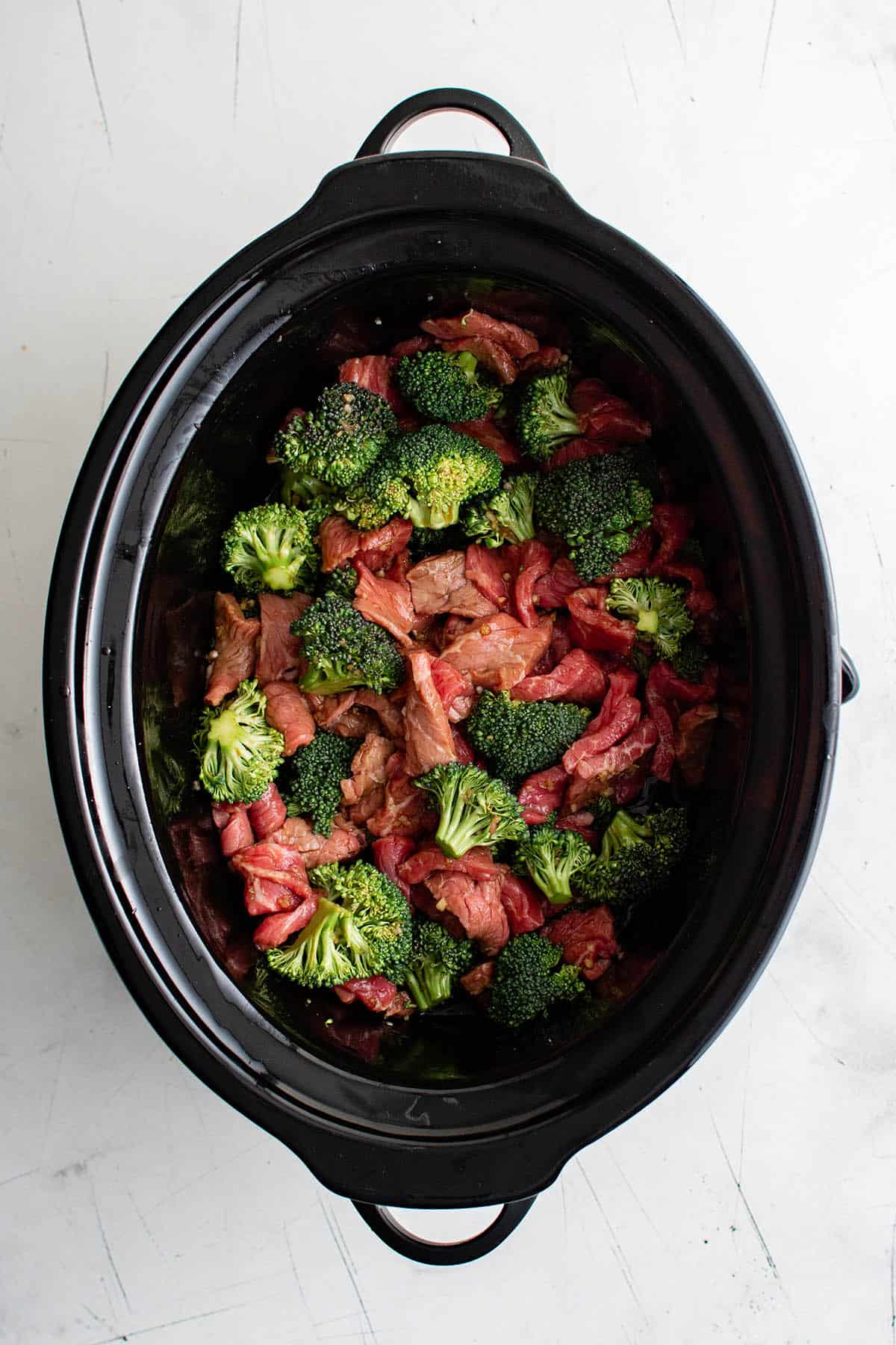 ingredients for beef and broccoli in the slow cooker